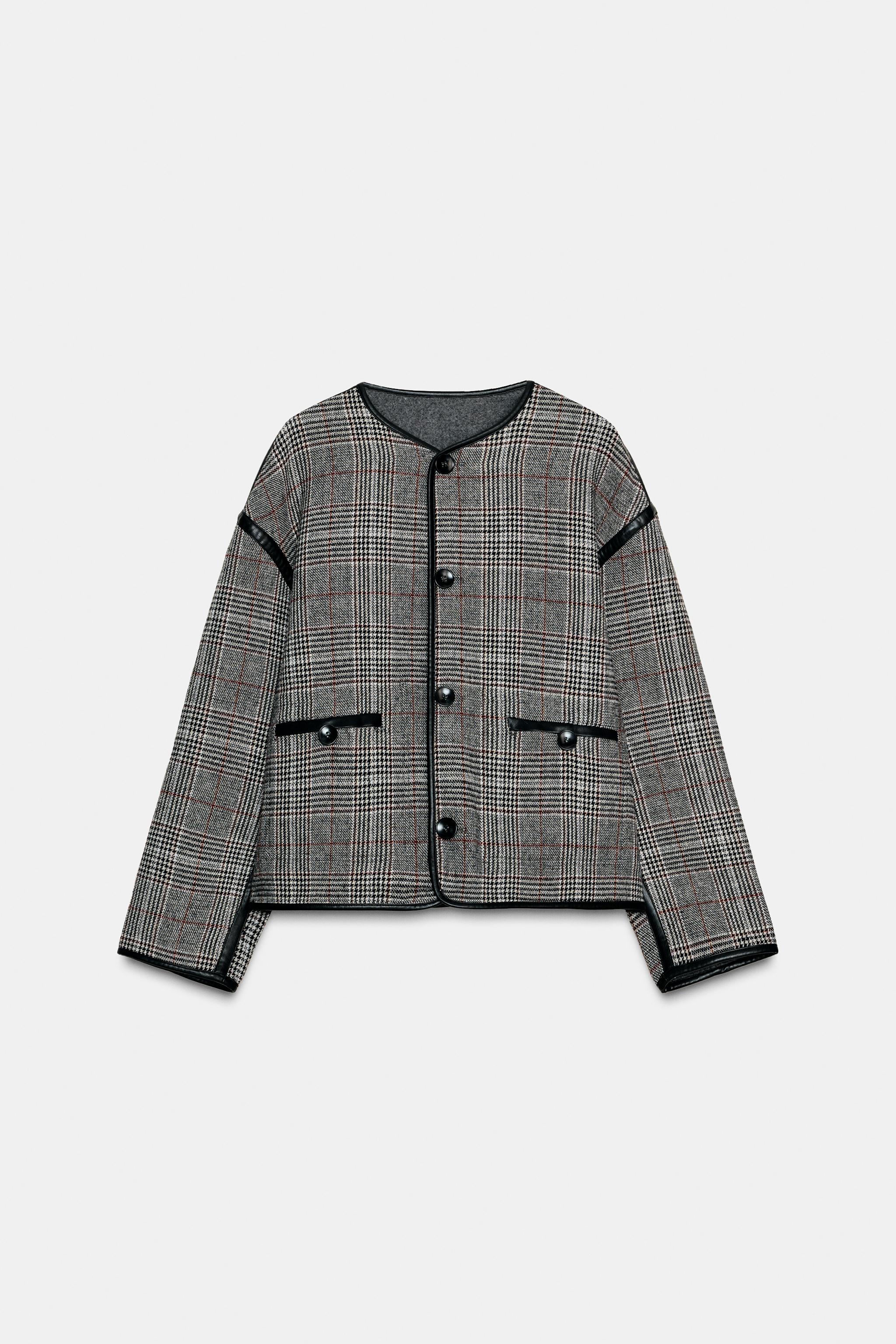 VESTE RÉVERSIBLE À LISERÉS EN MATIÈRE SYNTHÉTIQUE